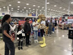 The Freddy Falcon mascot mingling with shoppers