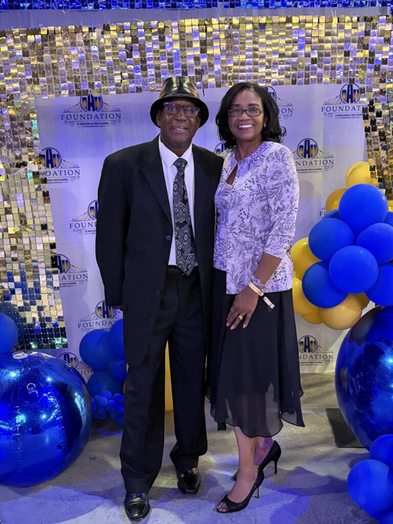 Man and woman posing at foundation event